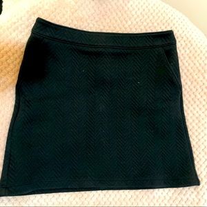 Black textured mini skirt